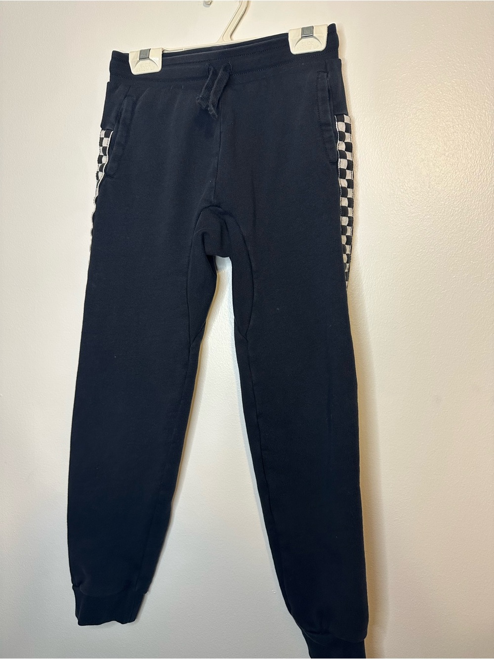 Tea Collection Black Joggers with Black-and-White Checkered Side Panels